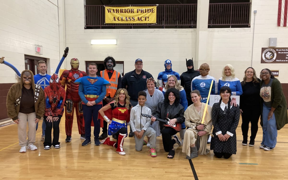 Superheroes fighting bullying at Stephen Mack Middle School