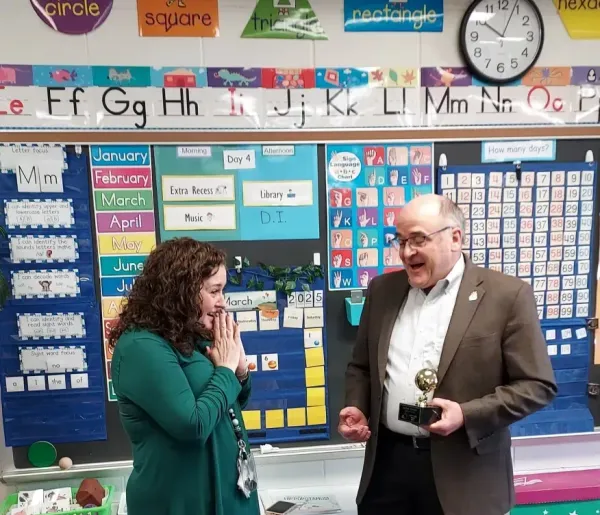 Ledgewood Elementary teacher Jackie Weerda claims a Golden Apple