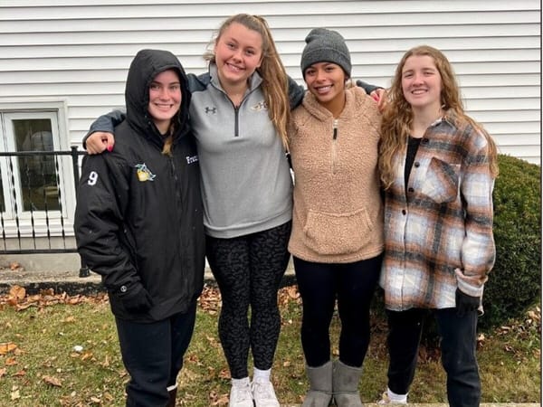 Teammates give back to our community - Hononegah Lady Indians help out at Old Stone Church