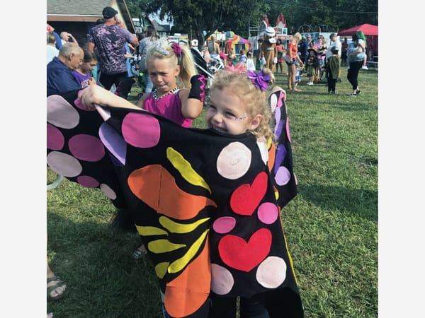 Fall Festival on Saturday: Kiddie Parade, wristbands on kids, and kids on stage