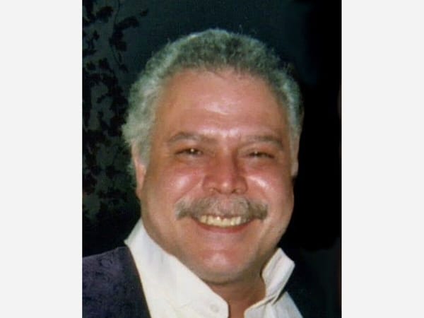John Rullo (1955-2021) loved to make his grandma's famous Sicilian pasta sauce