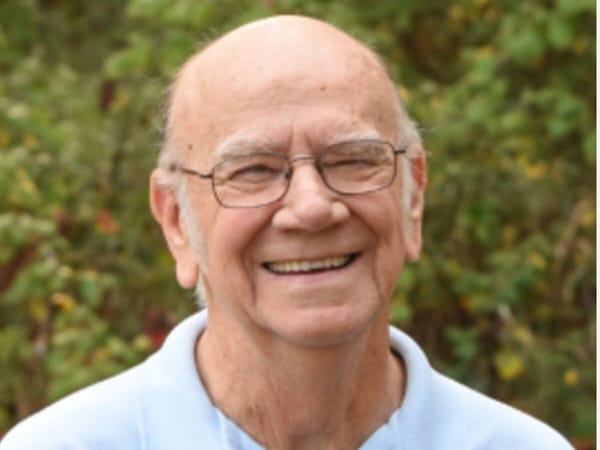 Lee Barnett (1941-2022) watched birds and loved his family