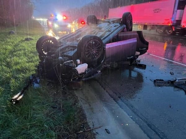 Rollover accident on wet I-90