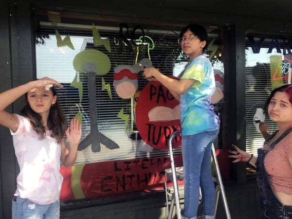 Photos: Hononegah student groups paint homecoming windows in Rockton