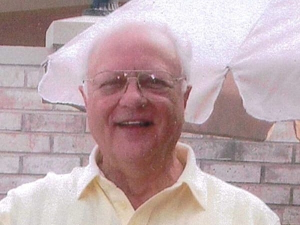 Russ Mosher: lab tech, veteran, organist, family man, feeder of birds