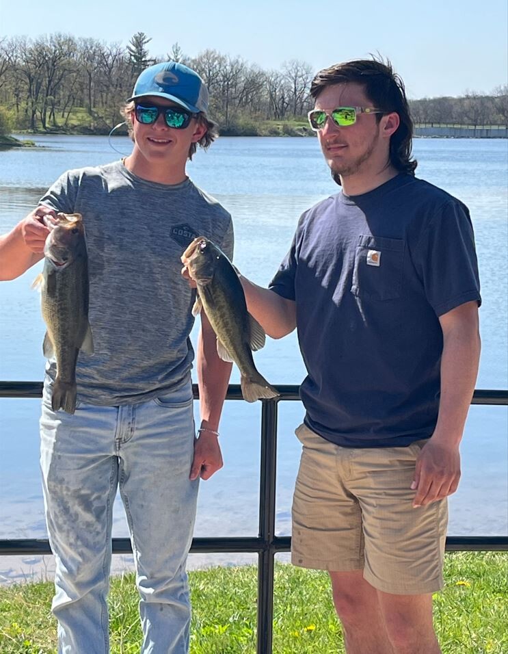 Colton Boelkes and Mason Lambert showing off the catches at the IHSA sectional Pierce Lake in Rock Cut State Park