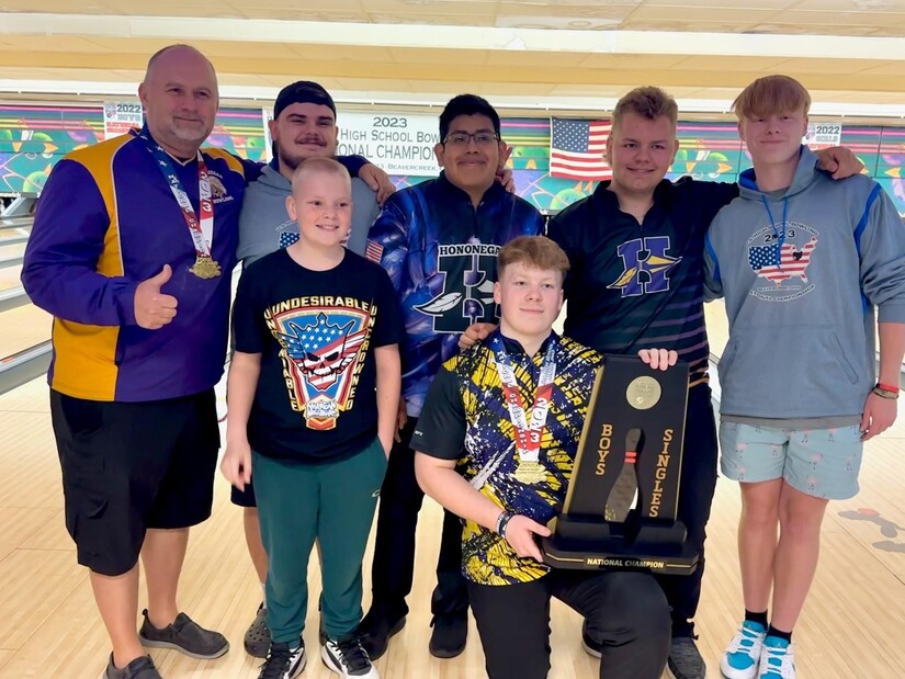 Bowling team with trophy at the 2023 U.S. High School Bowling National ChampionshipTM
