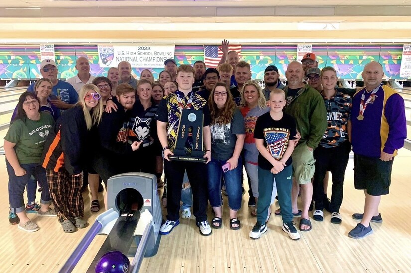 Charlie Hunt surrounded by his family and friends celebrate.