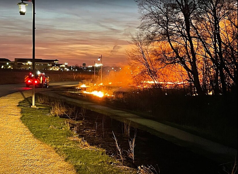 Harlem Roscoe Fire Department works a controlled burn at the Northpointe Clinic campus Tuesday night, Apr