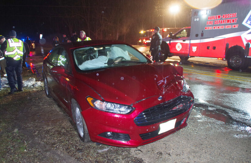 Red Ford after collision, with Harlem-Roscoe ambulance