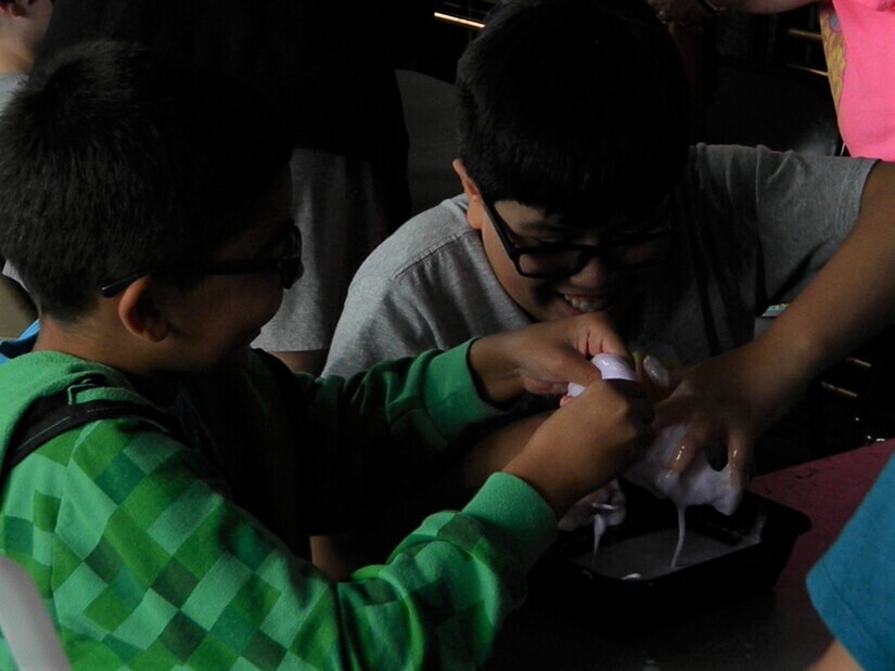 boys making slime