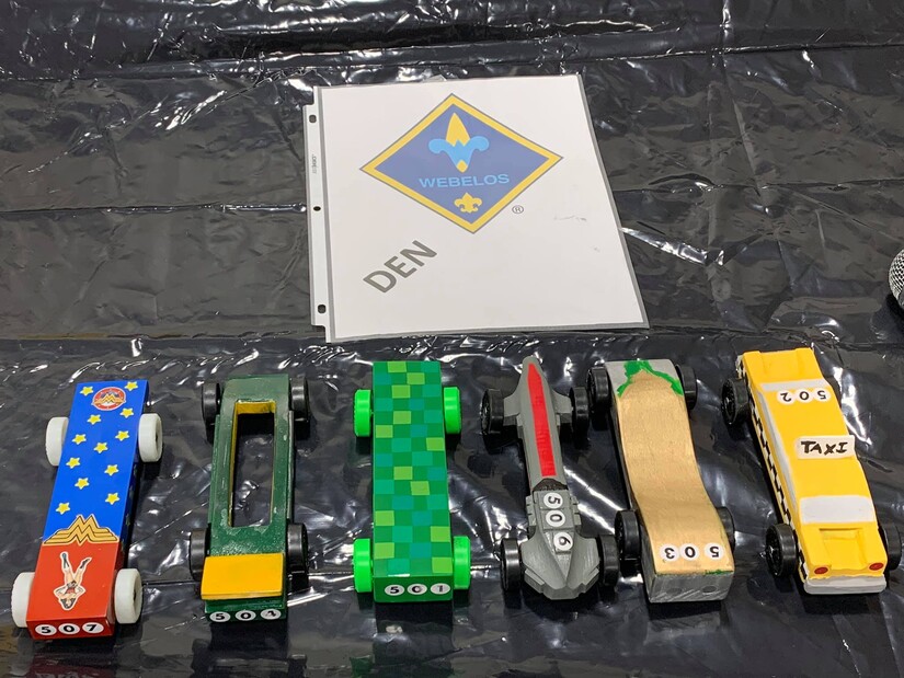 painted wooden cars from Pinewood Derby