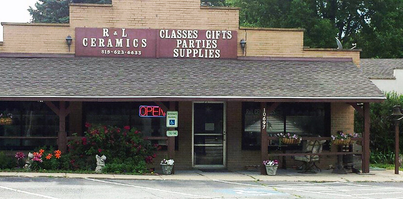 front of  R&L Ceramics. Roscoe IL, with sign "Classes Gifts Parties Supplies."