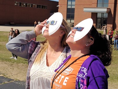 Photos: near total eclipse at Roscoe Middle School